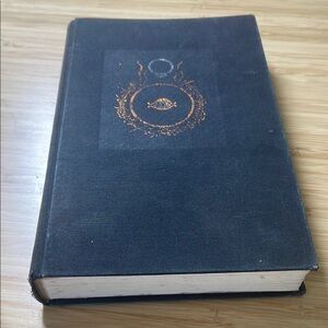Black Hardcover Book with Gold Design